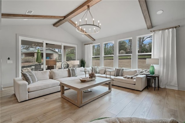 sunroom / solarium featuring visible vents, vaulted ceiling with beams, and an inviting chandelier