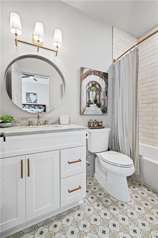 full bathroom featuring shower / tub combo with curtain, vanity, and toilet