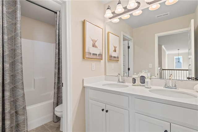 full bathroom featuring shower / bath combination with curtain, toilet, tile patterned floors, and vanity