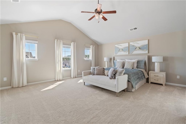 carpeted bedroom featuring ceiling fan and lofted ceiling