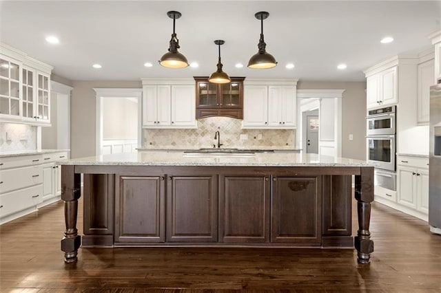 kitchen with white cabinets and stainless steel appliances