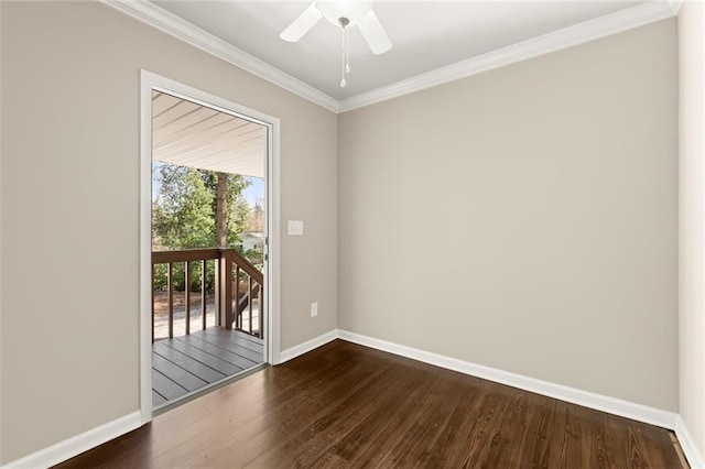 unfurnished room with dark wood finished floors, a ceiling fan, baseboards, and ornamental molding