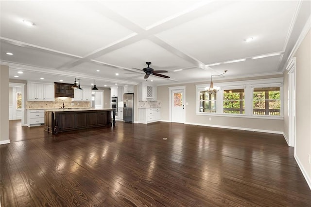 unfurnished living room with crown molding, baseboards, dark wood-style flooring, and coffered ceiling