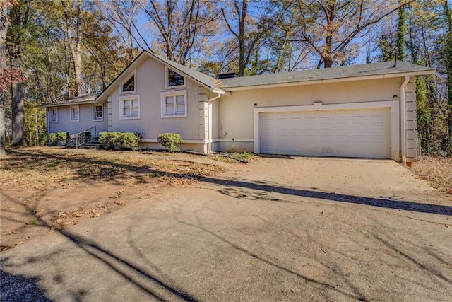 ranch-style home with a garage