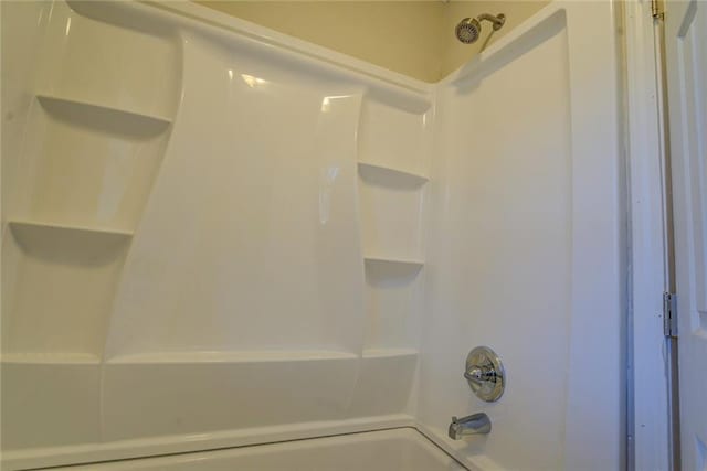 bathroom with shower / bathtub combination