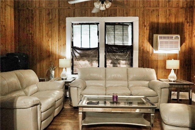 405 Pennington Ave SW, Rome, GA 30161 - living area with wooden walls, an AC wall unit, a ceiling fan, and dark wood-style floors