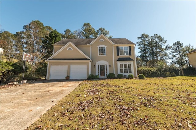 view of front of property with a garage