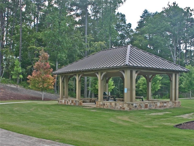 view of community with a yard and a gazebo