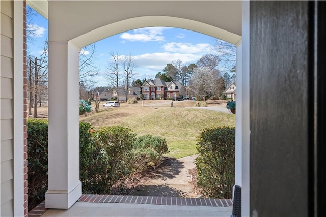 view of yard with a residential view