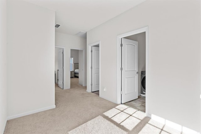 bedroom featuring light colored carpet