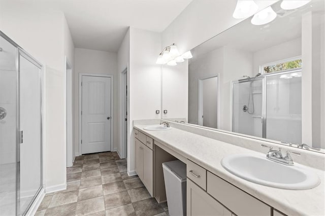 bathroom with vanity and an enclosed shower