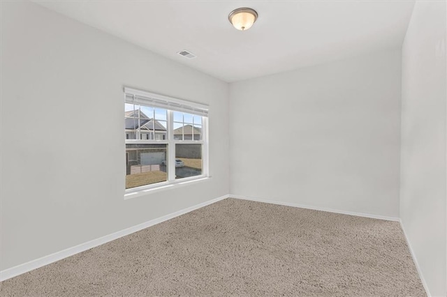 unfurnished room featuring carpet flooring