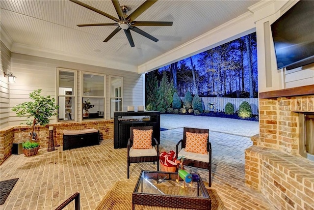 view of patio / terrace featuring ceiling fan