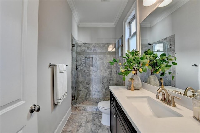 bathroom featuring vanity, an enclosed shower, crown molding, and toilet