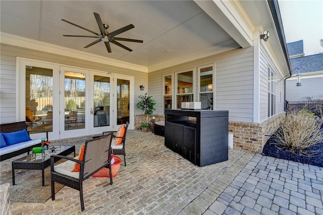 view of patio with french doors, ceiling fan, and outdoor lounge area