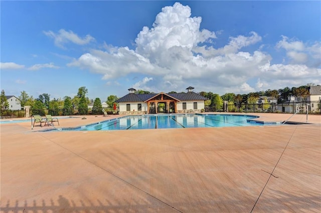 view of pool featuring a patio