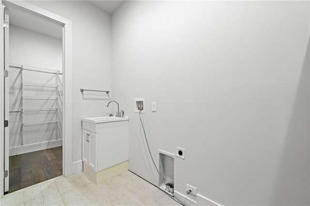 304 Old Cove Rd N, Jasper, GA 30143 - laundry area with electric dryer hookup, washer hookup, and cabinet space