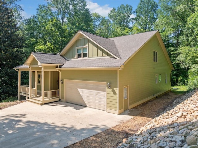 304 Old Cove Rd N, Jasper, GA 30143 - view of front of property with board and batten siding, a porch, concrete driveway, and a shingled roof