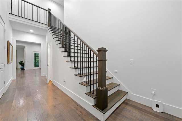 304 Old Cove Rd N, Jasper, GA 30143 - stairs featuring wood-type flooring, a towering ceiling, and recessed lighting