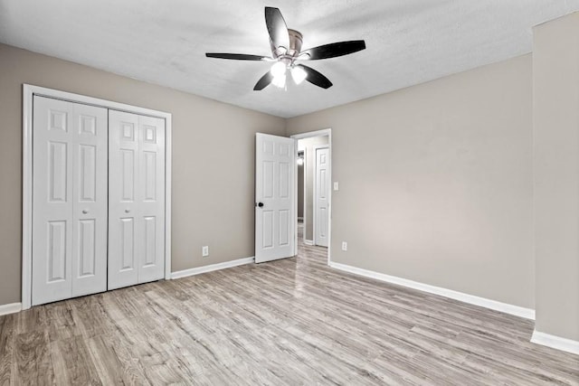 2617 Peggy Sue Ln, Morrow, GA 30260 - unfurnished bedroom with wood finished floors, baseboards, a closet, and ceiling fan