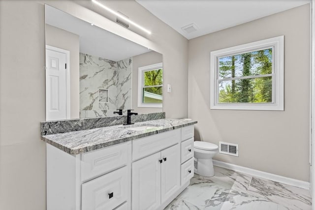 2617 Peggy Sue Ln, Morrow, GA 30260 - full bathroom with marble finish flooring, baseboards, toilet, and vanity