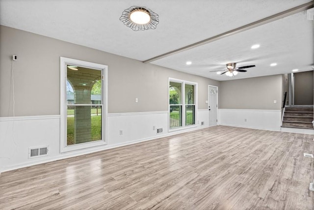 2617 Peggy Sue Ln, Morrow, GA 30260 - unfurnished living room with a wainscoted wall, stairs, a ceiling fan, wood finished floors, and recessed lighting