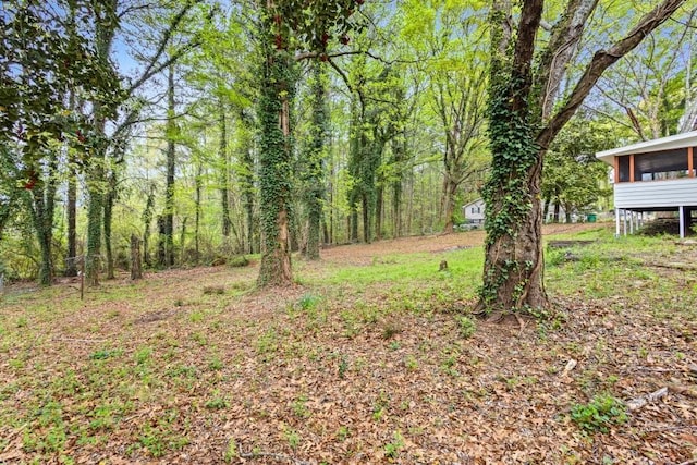 2617 Peggy Sue Ln, Morrow, GA 30260 - view of yard with a forest view and a sunroom