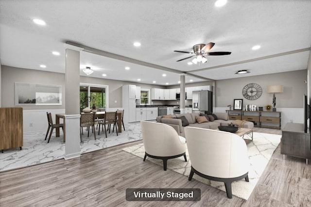 2617 Peggy Sue Ln, Morrow, GA 30260 - living area featuring recessed lighting, light wood-style floors, a ceiling fan, and a textured ceiling