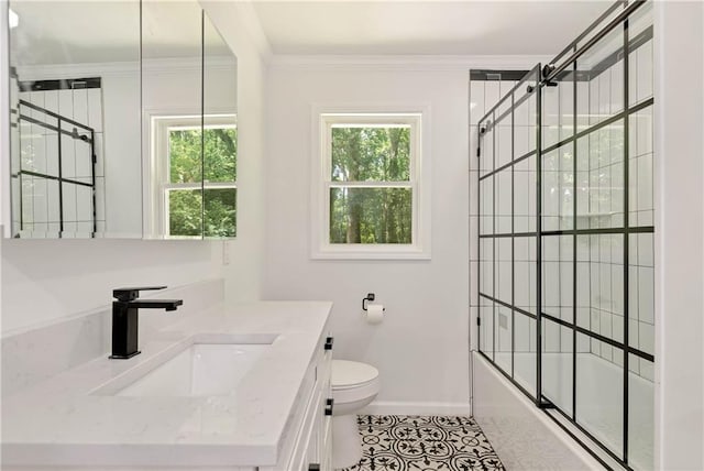 full bathroom featuring tile patterned flooring, a wealth of natural light, shower / bath combination with glass door, and toilet