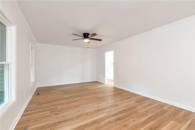 empty room featuring ceiling fan and light wood-type flooring