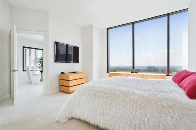 2828 Peachtree Rd NW Unit 2002, Atlanta, GA 30305 - carpeted bedroom featuring baseboards
