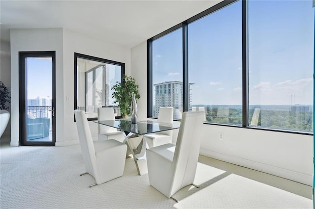 2828 Peachtree Rd NW Unit 2002, Atlanta, GA 30305 - carpeted dining area with baseboards