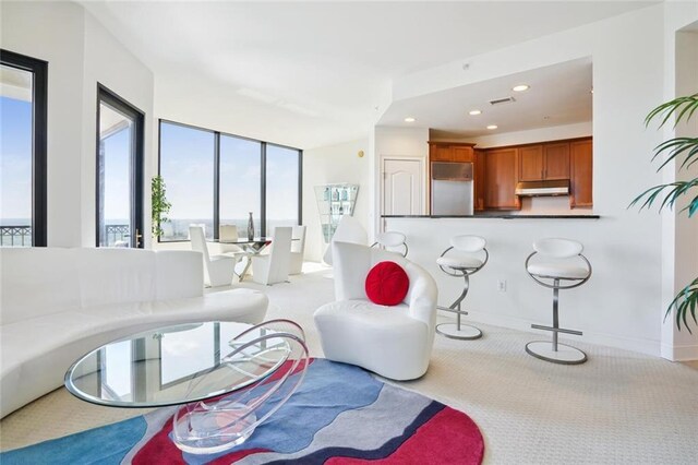 2828 Peachtree Rd NW Unit 2002, Atlanta, GA 30305 - living room with carpet and recessed lighting