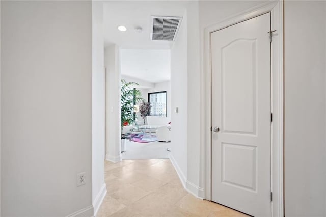 2828 Peachtree Rd NW Unit 2002, Atlanta, GA 30305 - corridor with baseboards and light tile patterned flooring