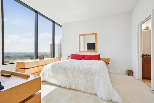 2828 Peachtree Rd NW Unit 2002, Atlanta, GA 30305 - carpeted bedroom with baseboards