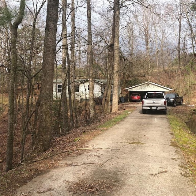 view of road with driveway