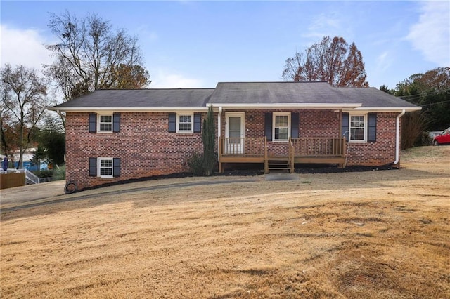 ranch-style house with a front yard