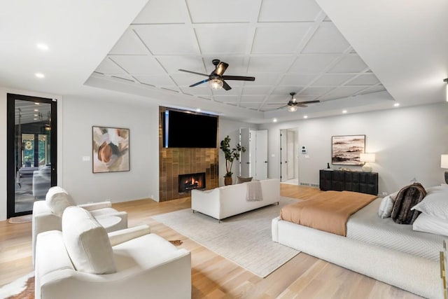 1430 N Harris Rdg, Atlanta, GA 30327 - living area with light wood-style flooring, a fireplace, a ceiling fan, recessed lighting, and baseboards