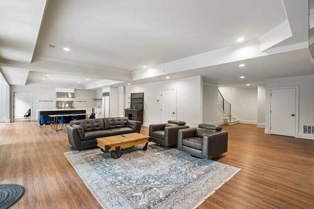 1430 N Harris Rdg, Atlanta, GA 30327 - living room with ornamental molding, stairs, a tray ceiling, light wood-type flooring, and recessed lighting