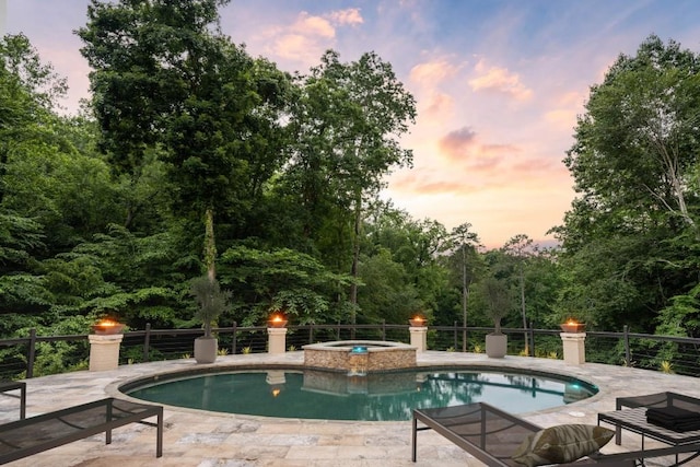 1430 N Harris Rdg, Atlanta, GA 30327 - pool at dusk with a pool with connected hot tub