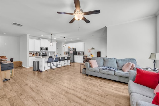 5615 Parkview Ln, Flowery Branch, GA 30542 - living area featuring recessed lighting, crown molding, ceiling fan, and light wood-style flooring