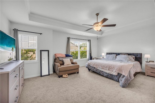 5615 Parkview Ln, Flowery Branch, GA 30542 - bedroom with a raised ceiling, light colored carpet, multiple windows, a ceiling fan, and ornamental molding