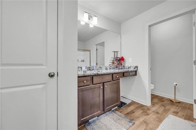5615 Parkview Ln, Flowery Branch, GA 30542 - bathroom featuring vanity and wood finished floors