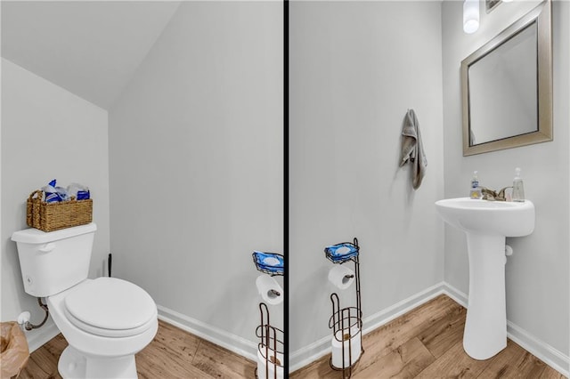 5615 Parkview Ln, Flowery Branch, GA 30542 - half bath featuring wood finished floors and vaulted ceiling