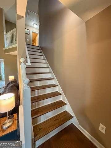 3269 N Winds Trl N, Douglasville, GA 30135 - staircase with baseboards