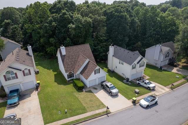 3269 N Winds Trl N, Douglasville, GA 30135 - drone / aerial view of a heavily wooded area