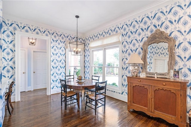 dining room with dark wood-type flooring, baseboards, and wallpapered walls