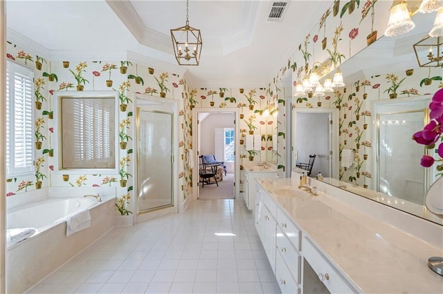 full bath featuring a raised ceiling, vanity, an inviting chandelier, and wallpapered walls