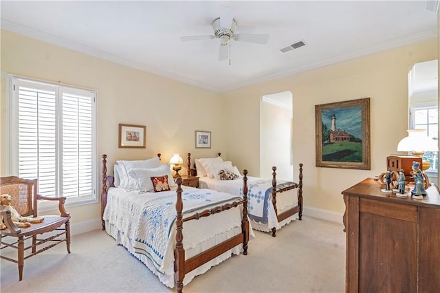 bedroom with crown molding, visible vents, and light colored carpet