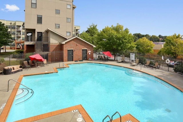 view of pool featuring a patio